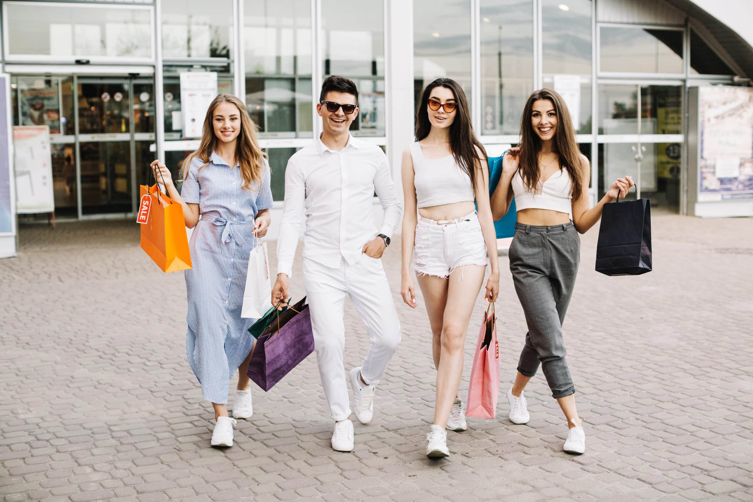 cheerful buyers with bags scaled Glam Pulse Store
